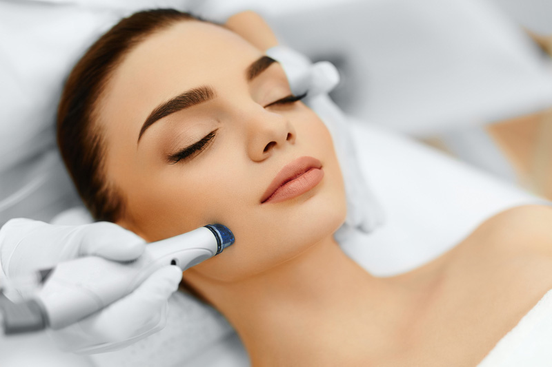 Woman getting microdermabrasion